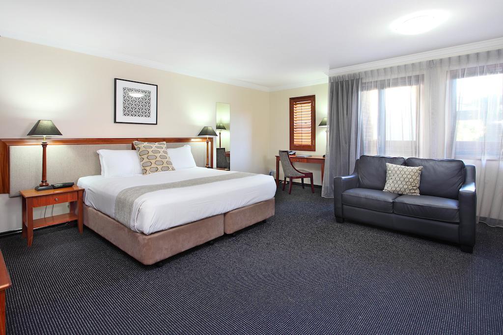 Hotel Ramada By Wyndham Brisbane Windsor Habitación foto
